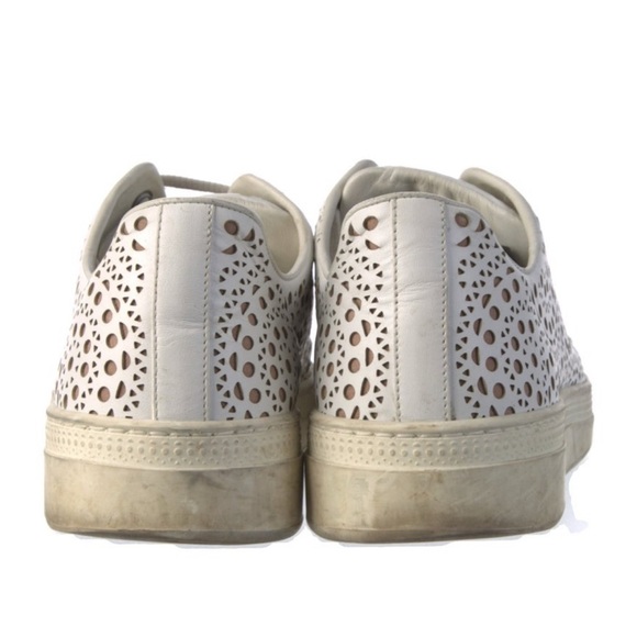 ALAÏA White Laser-Cut Leather Sneakers | IT 37 (US 7) 
Women's White Sneakers - Picture 4 of 5